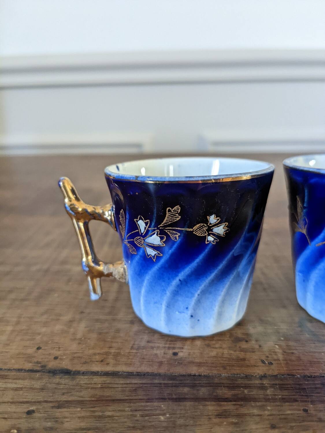 Two Luneville coffee cups