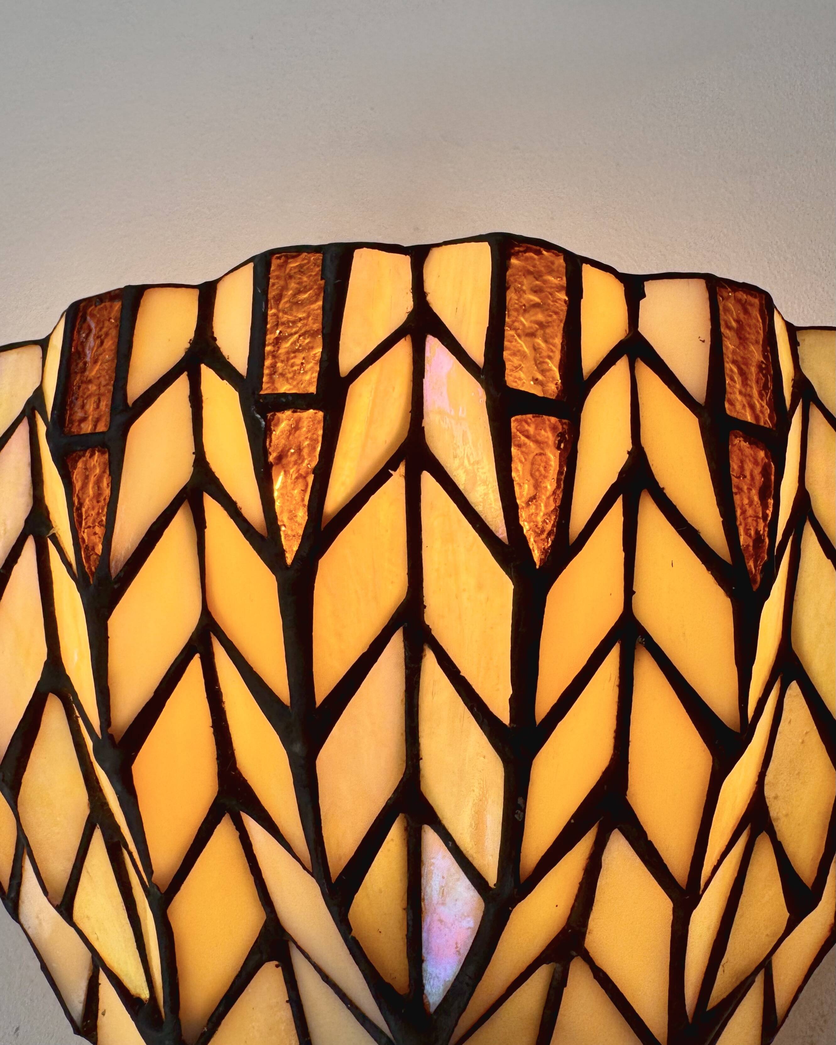 Pair of vintage "stained glass" wall lights in copper and glass, France, 1970.