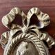 Paire d’appliques en bronze doré style Louis XVI