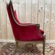 Art Nouveau gondola armchair – Carved wood & red theatre velvet – France