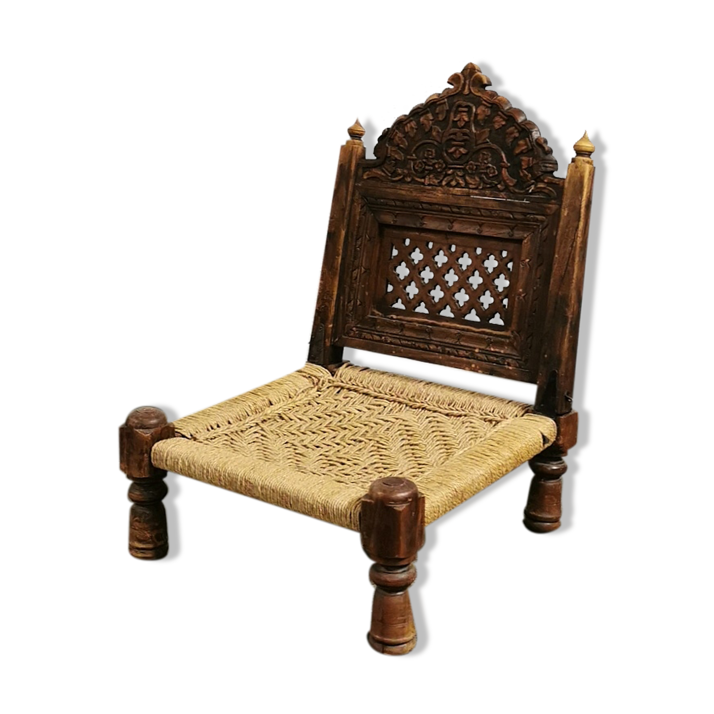 Ancient ethnic chair made of solid wood and rope