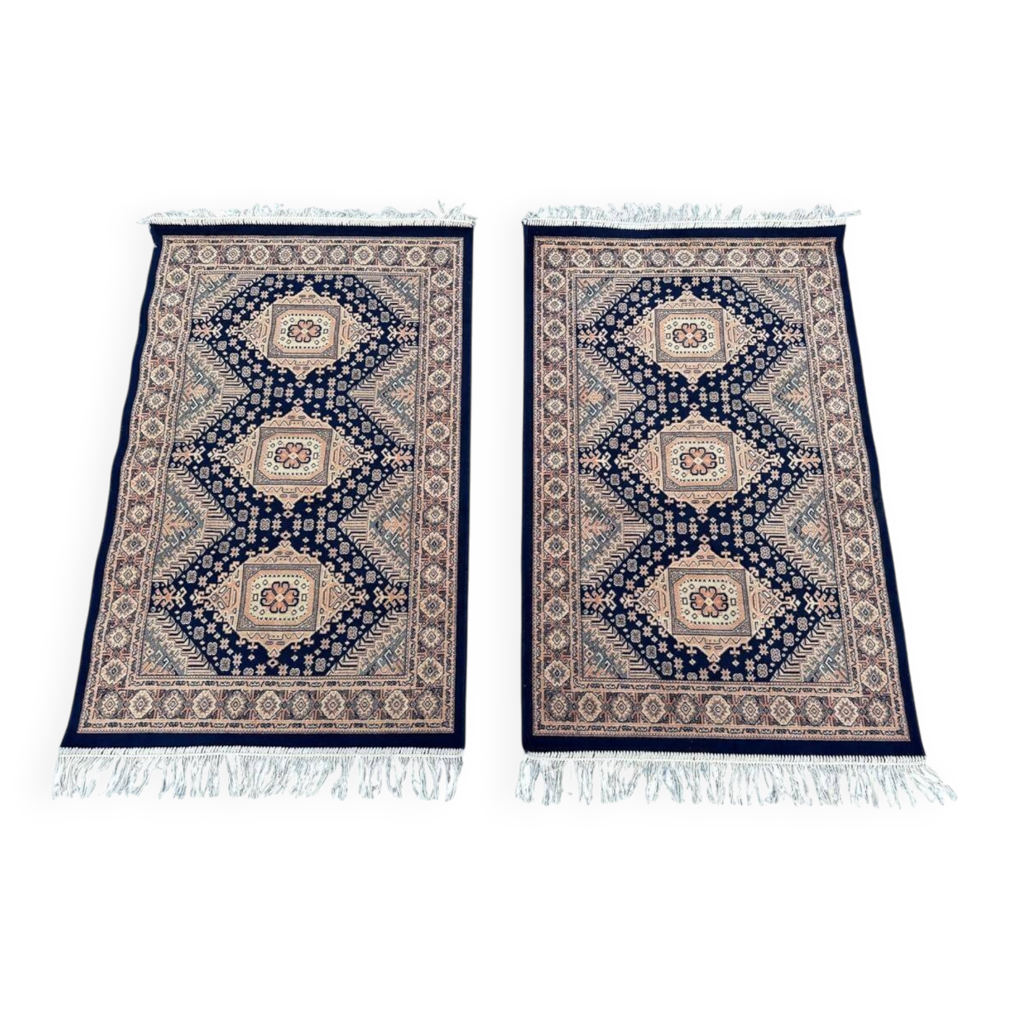 Pair of oriental rugs 110cm x 70cm