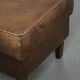 Sheepskin ottoman with a light brown colour scheme and a vintage look