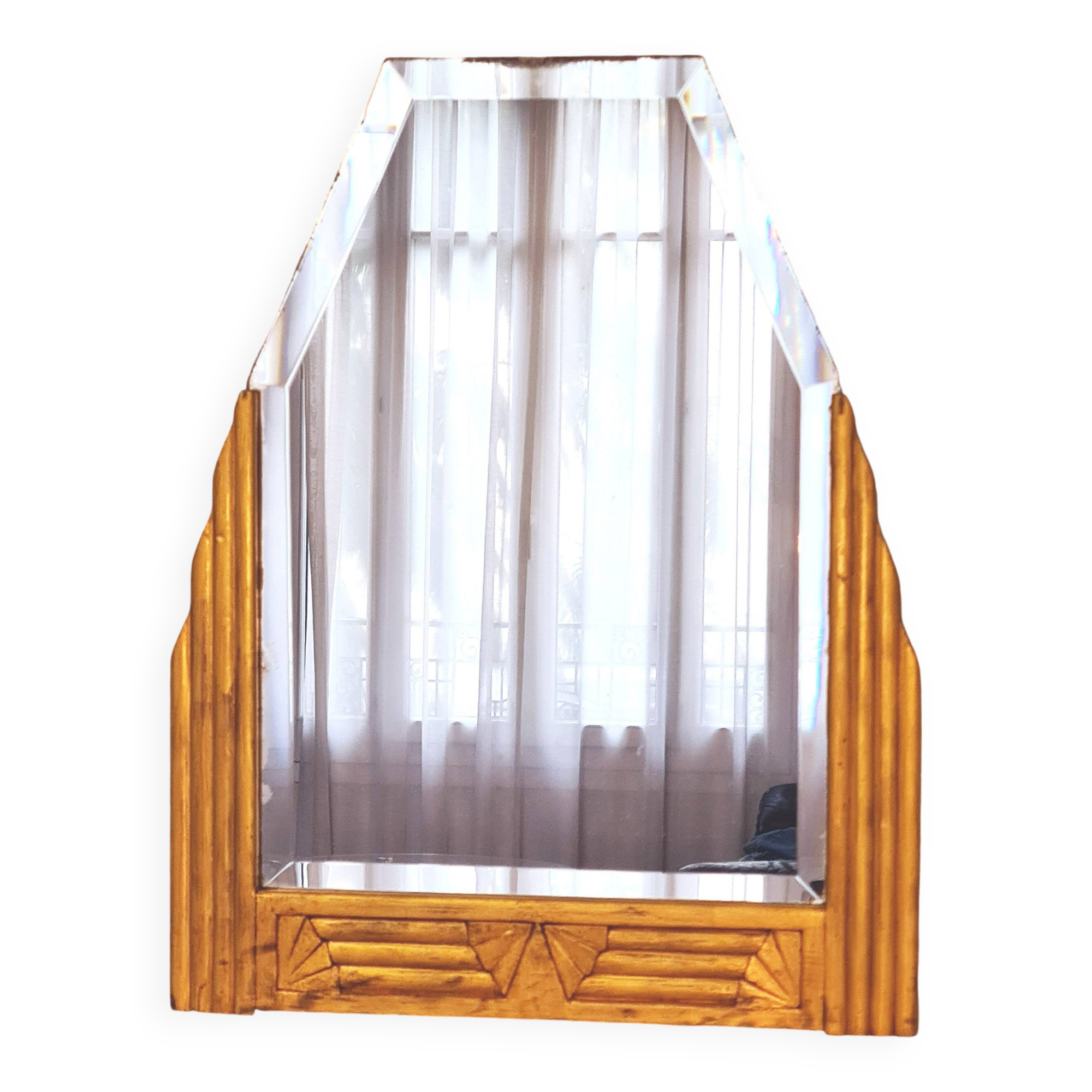 Antique Art Deco mercury mirror, in carved wood with gold leaf.