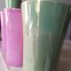 8 coloured cups in earthenware