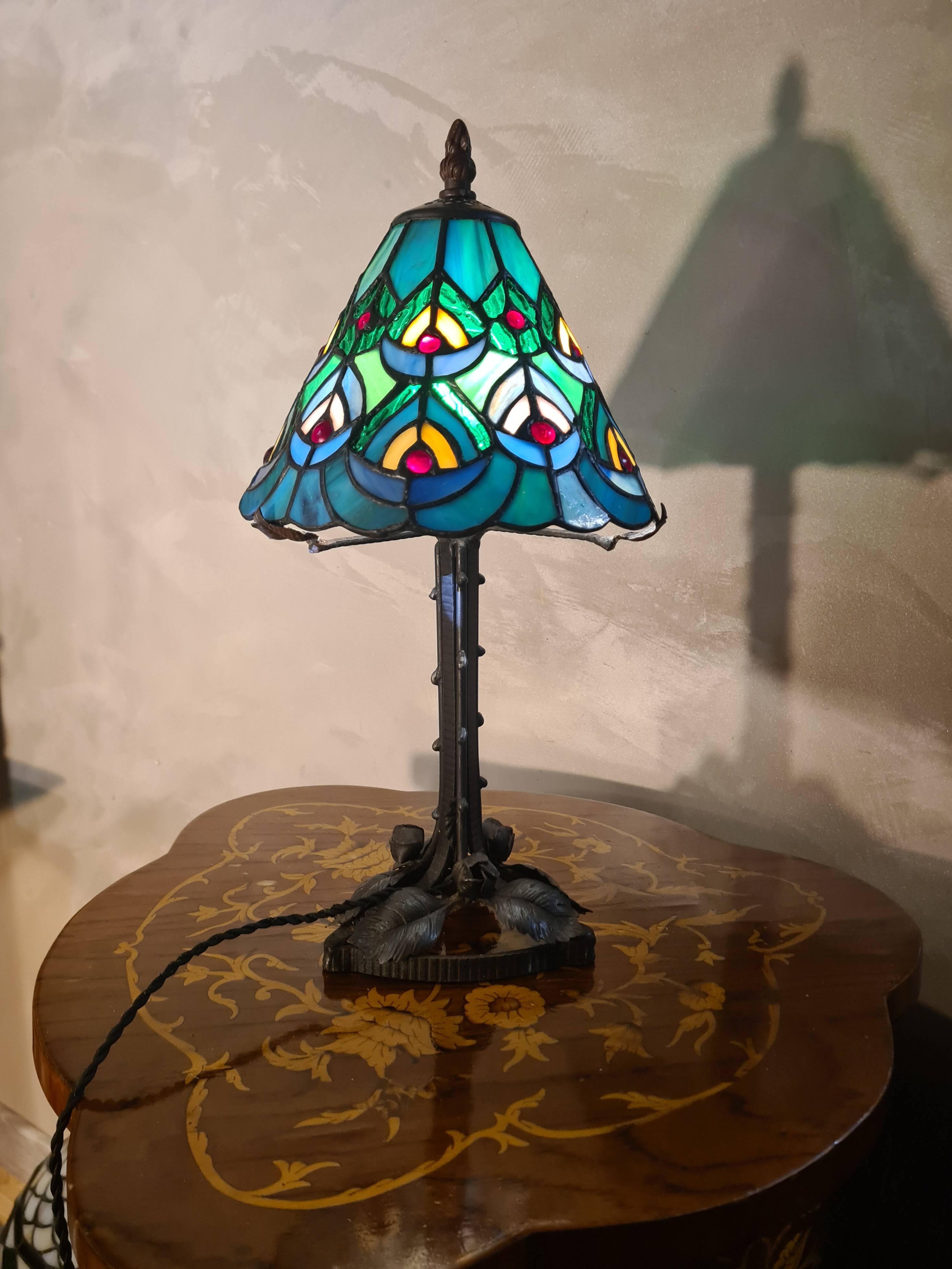 antique wrought iron floor lamp, 1900 to 1940 with stained glass lampshade
