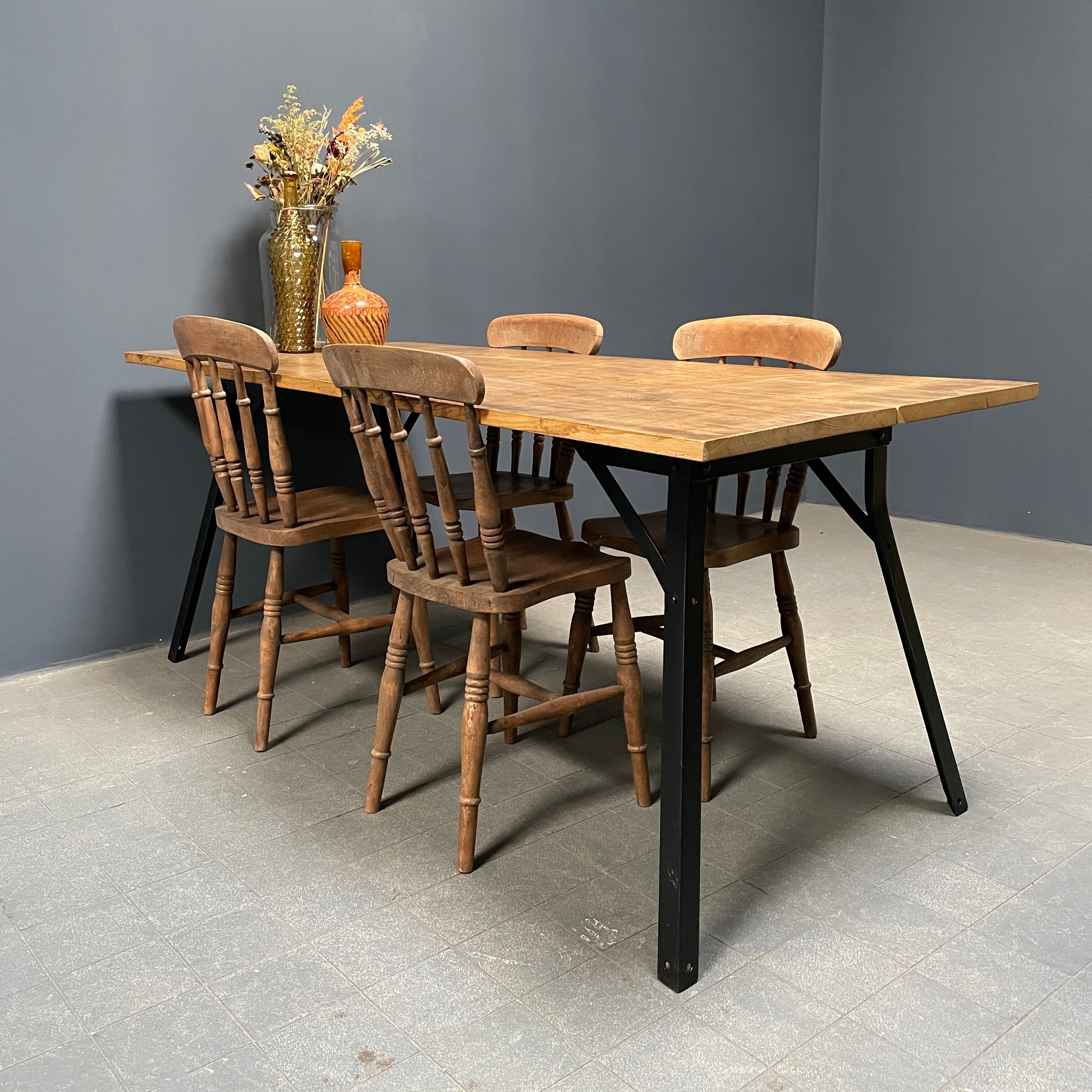 Handmade industrial oak dining table with black metal legs