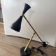 Eichholtz Cordero desk lamp in brass, black metal and marble.
