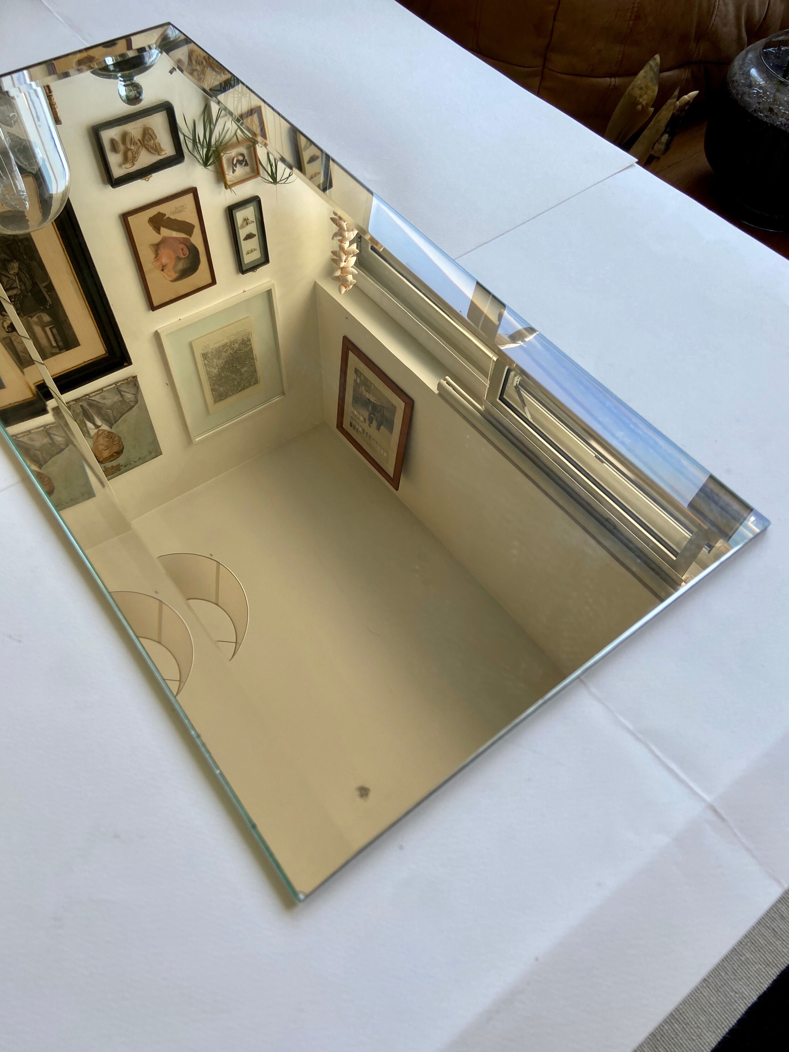 Bevelled mirror 29.5 x 64.5 cm