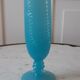 Turquoise blue serrated opaline vase