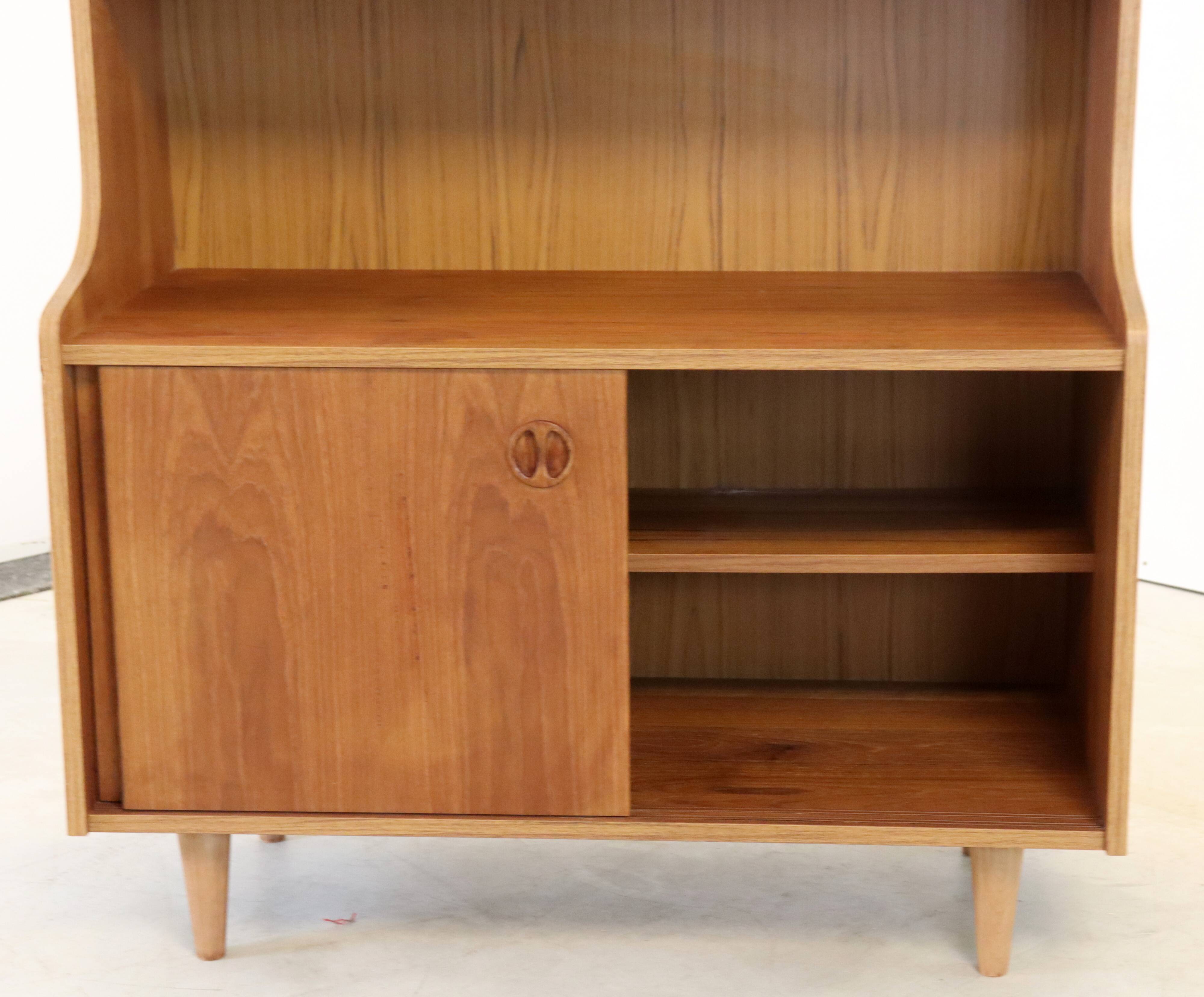 vintage bookcase with full on storage space.