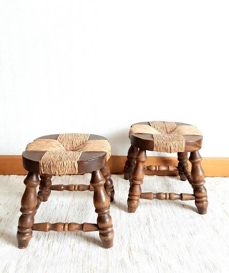 Pair of wood and straw fireplace stools, 1950s