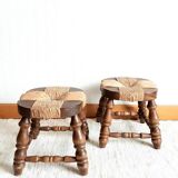 Pair of wood and straw fireplace stools, 1950s