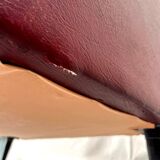 Vintage burgundy armchair, compass base in black metal and brass