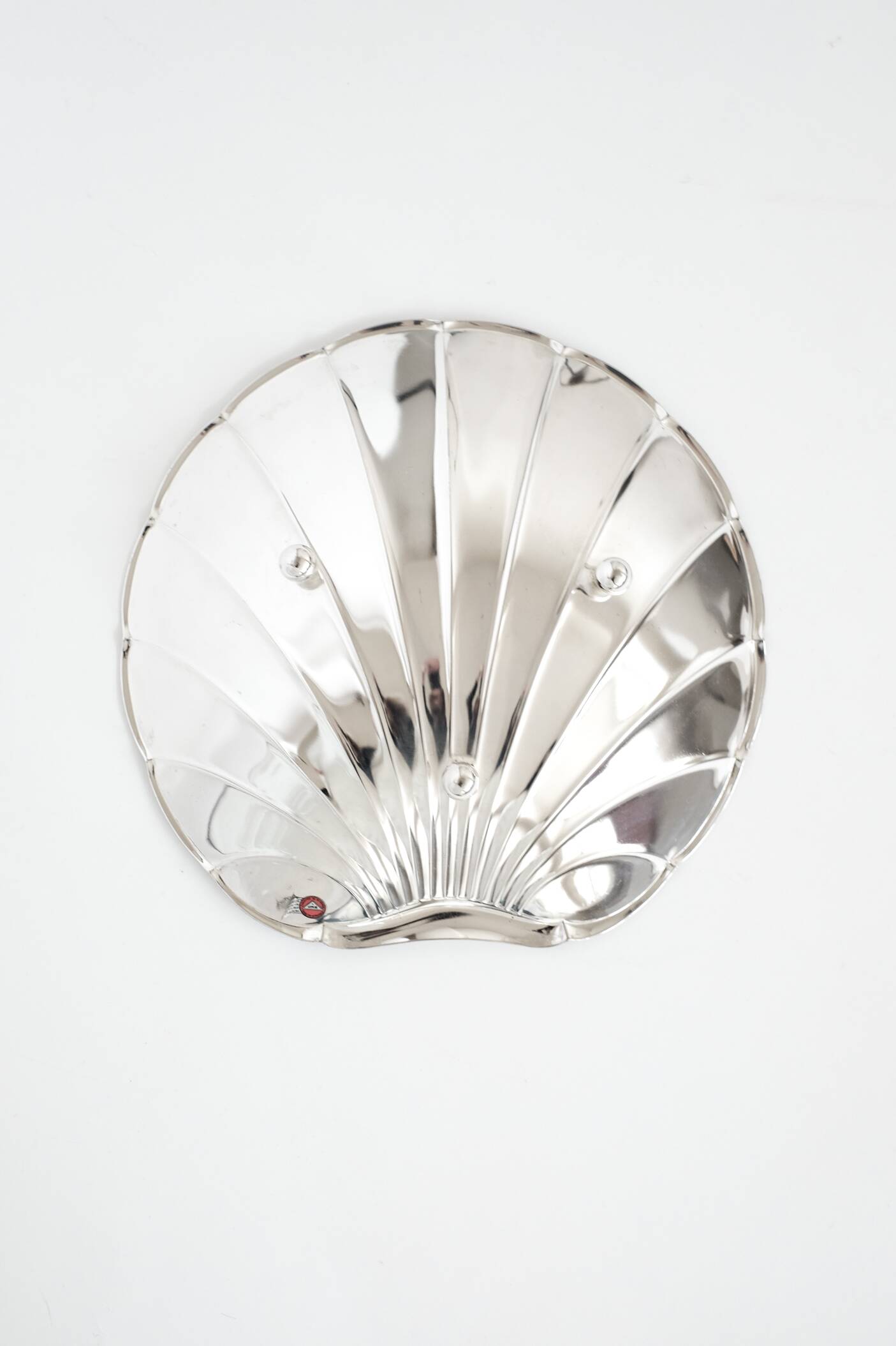 Grand plat en forme de coquillage plaqué argent