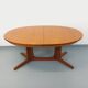 Vintage oval dining table Baumann from the 60s and 70s in teak with extension.
