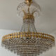 Chandelier cascade of tassels and brass
