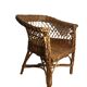 Vintage, children's armchair in woven rattan from around 1970.