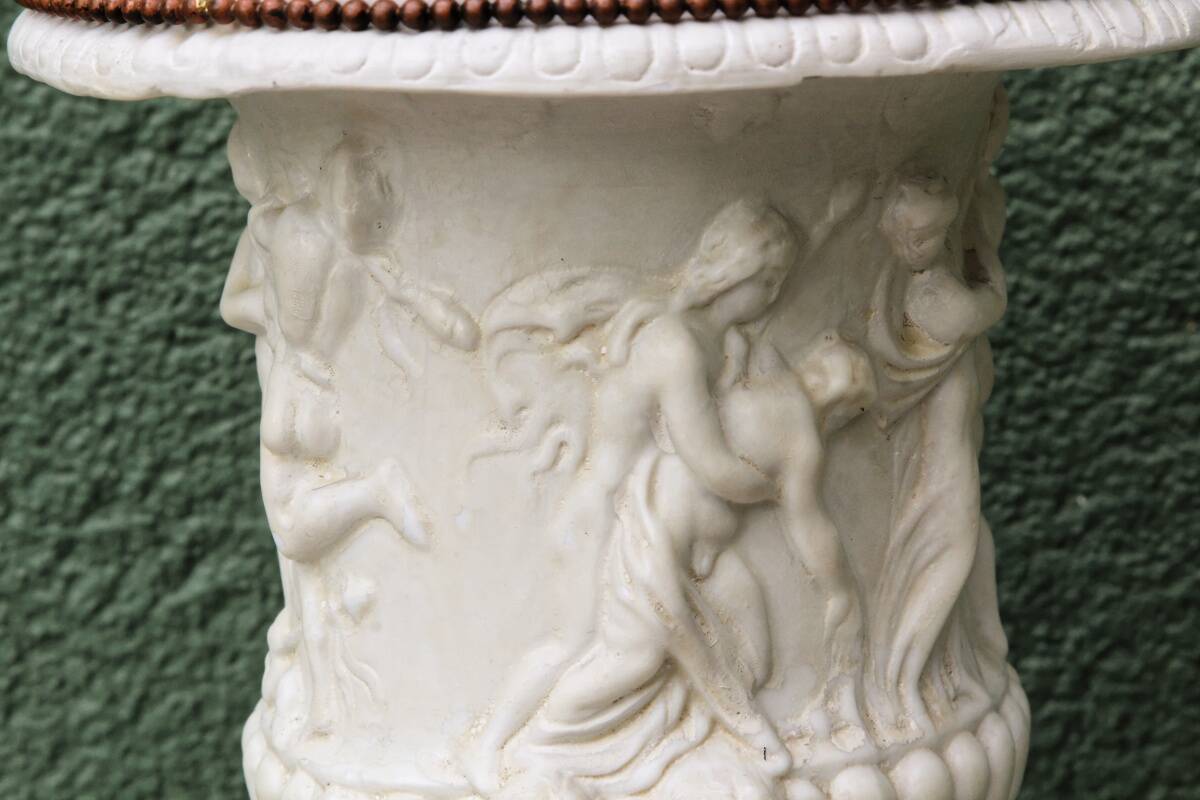 Pair of Medicis Borghese vases in porcelain biscuit and brass.