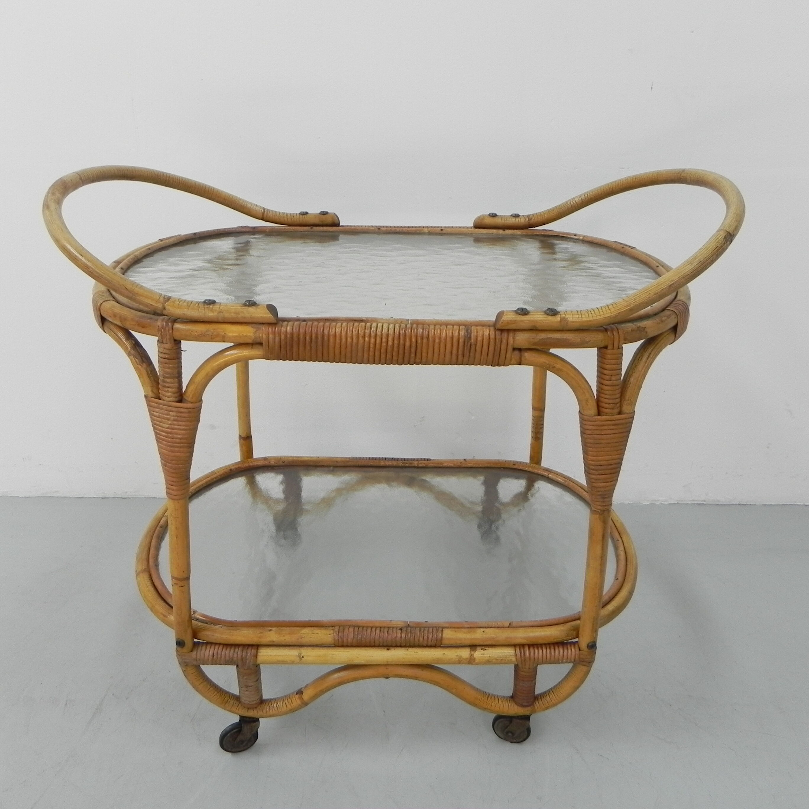 Bamboo, rattan serving trolley on castors