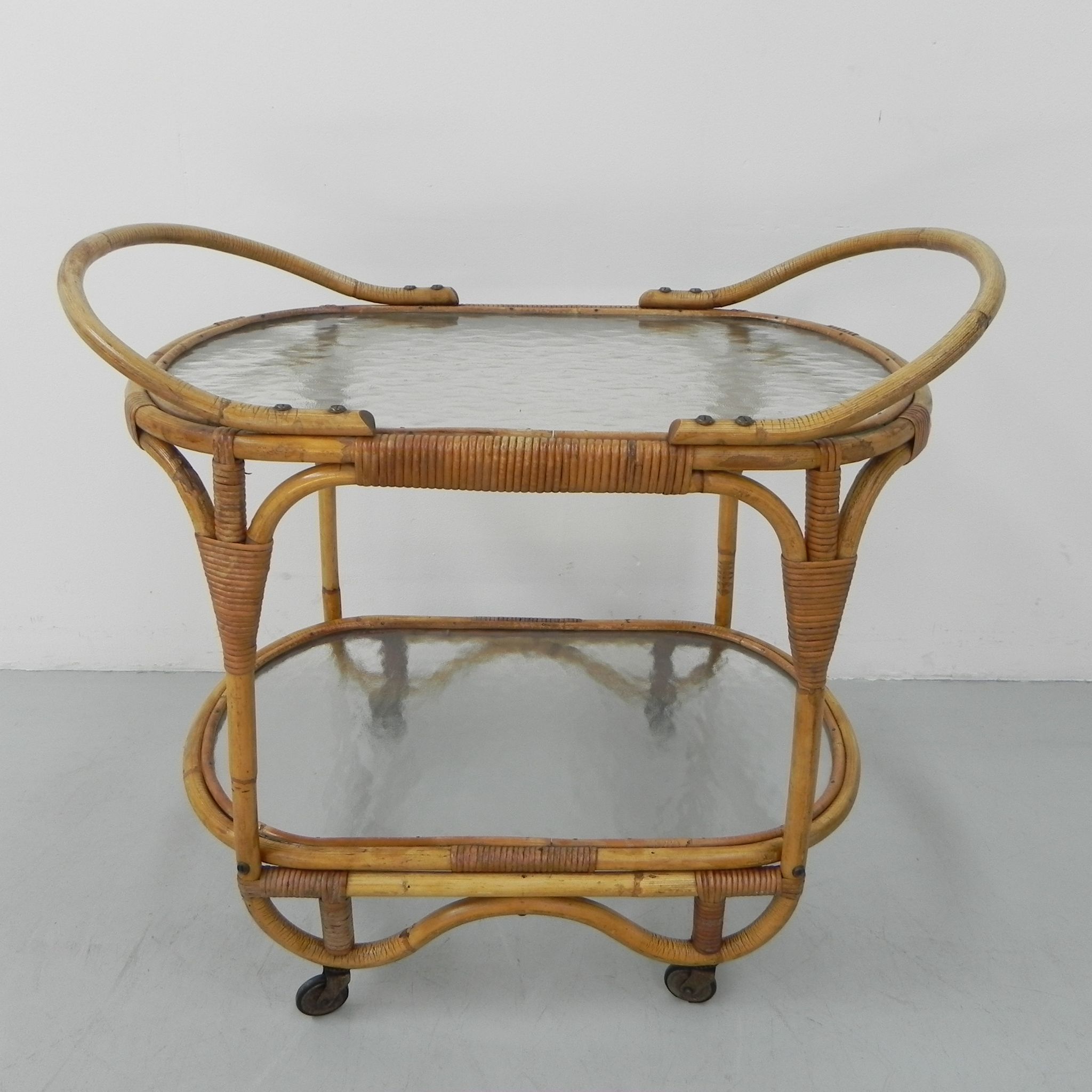 Bamboo, rattan serving trolley on castors