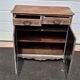 Antique chest of drawers with a cerused and patinated finish.