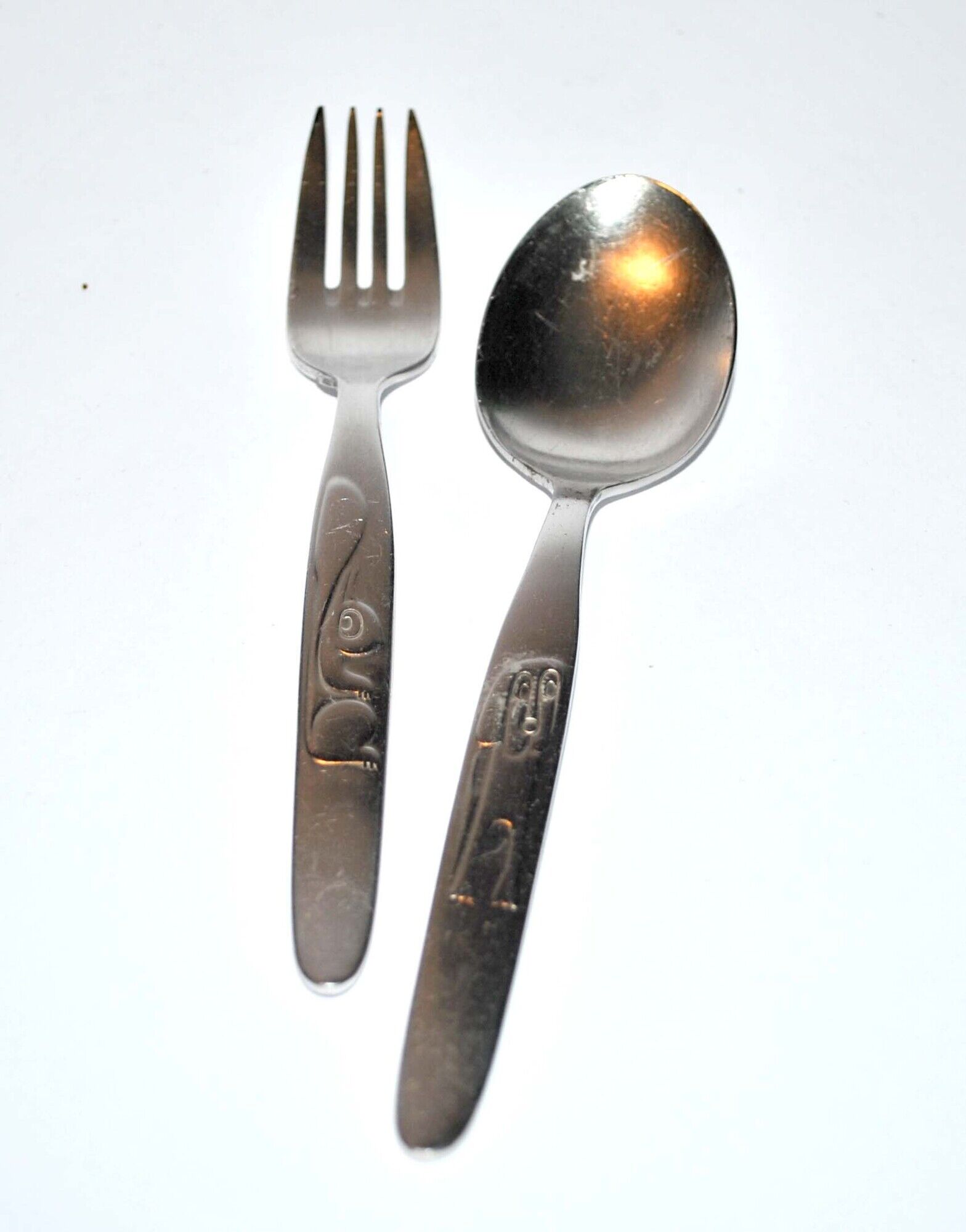 Vintage stainless steel children's cutlery - dog and squirrel germany