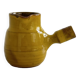 Yellow glazed ceramic sauce boat or milk jug