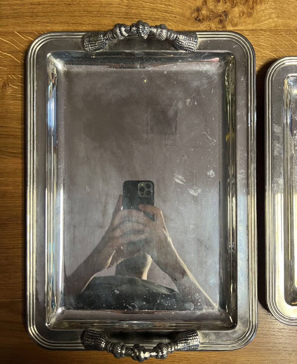 2 silver metal serving trays