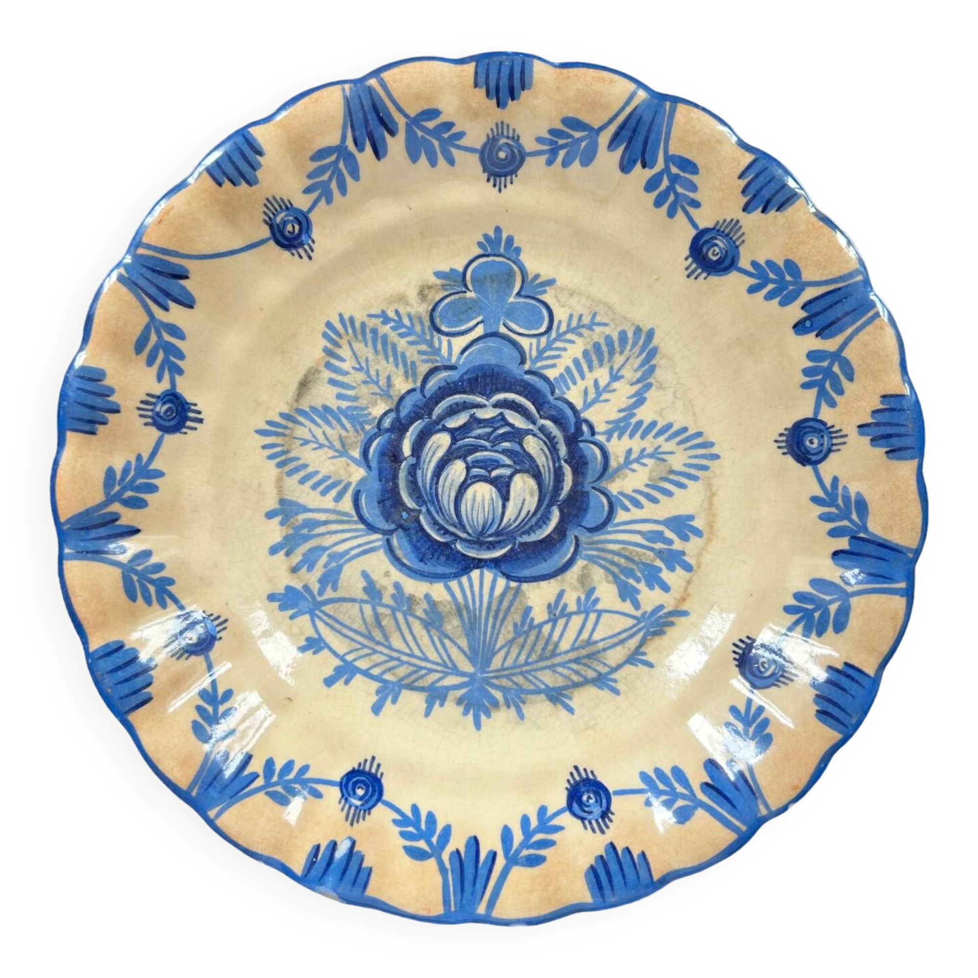 Old dish with blue floral decoration
