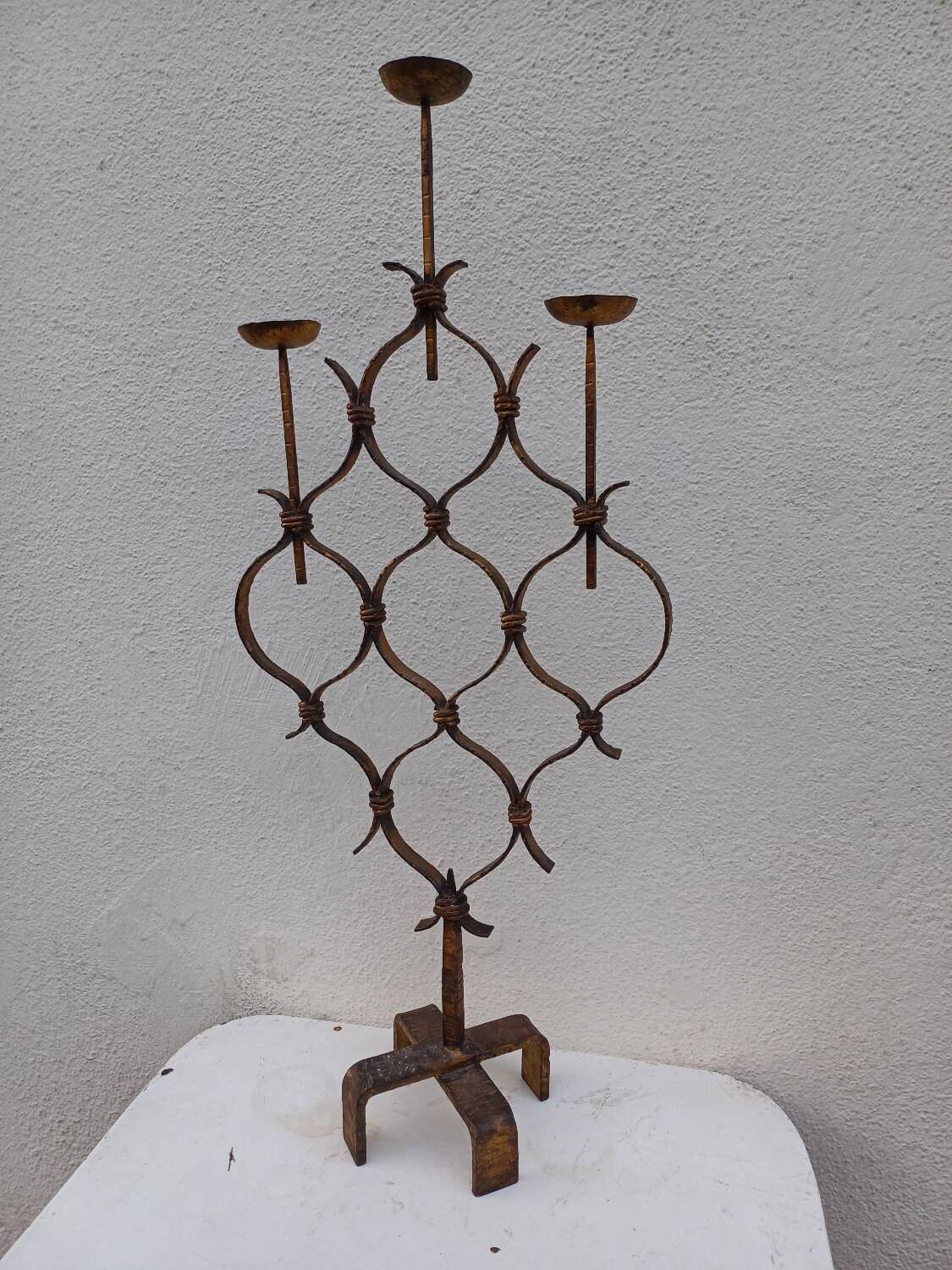 Large hammered wrought iron table candlesticks, gilded, 1950s, 60s