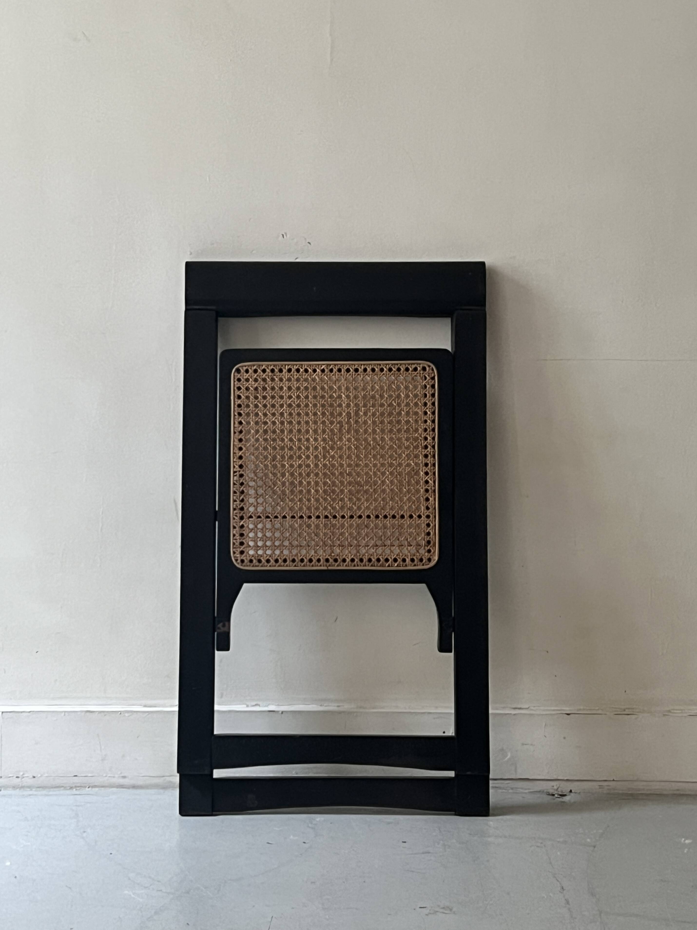 Folding designer chair in black wood and caning, Aldo Jacober 1970