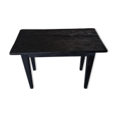 Table basse en bois brûlé