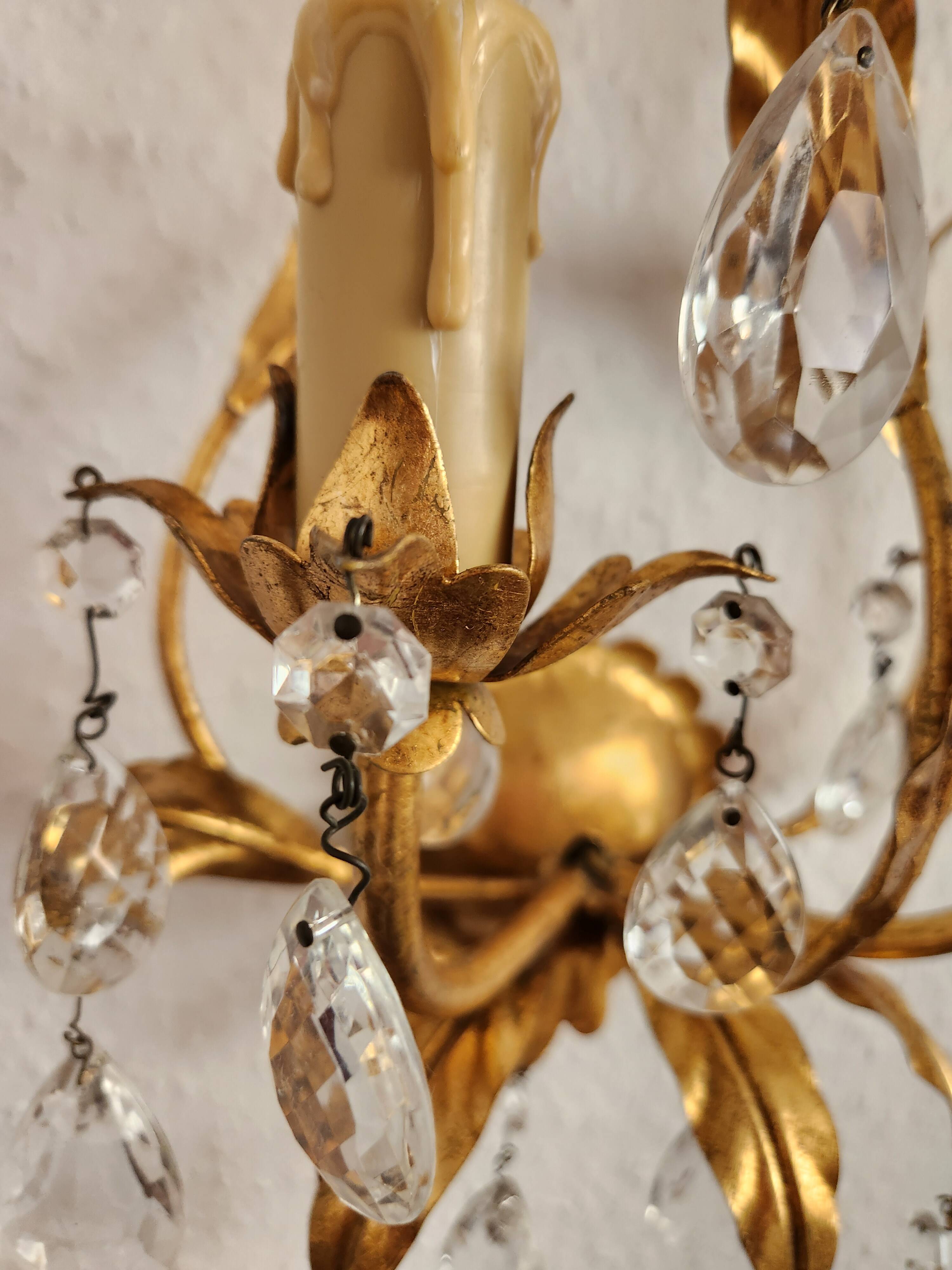 Hand-forged wall lamp gilded with gold leaf and crystals, Italy