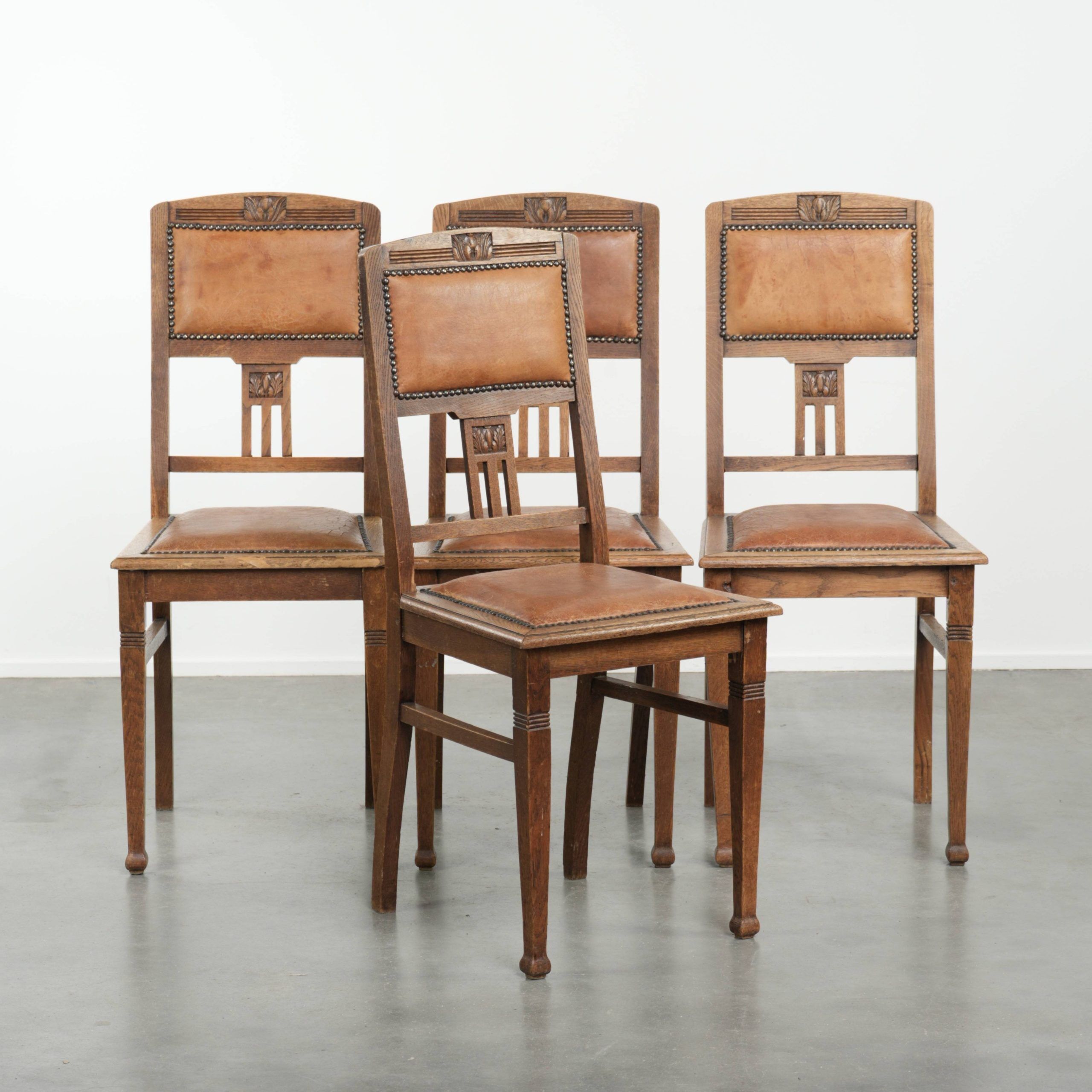 Set of 4 antique oak dining chairs in Art Nouveau style with sheepskin