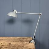 Grey two-arm Kaiser Idell clamp lamp model