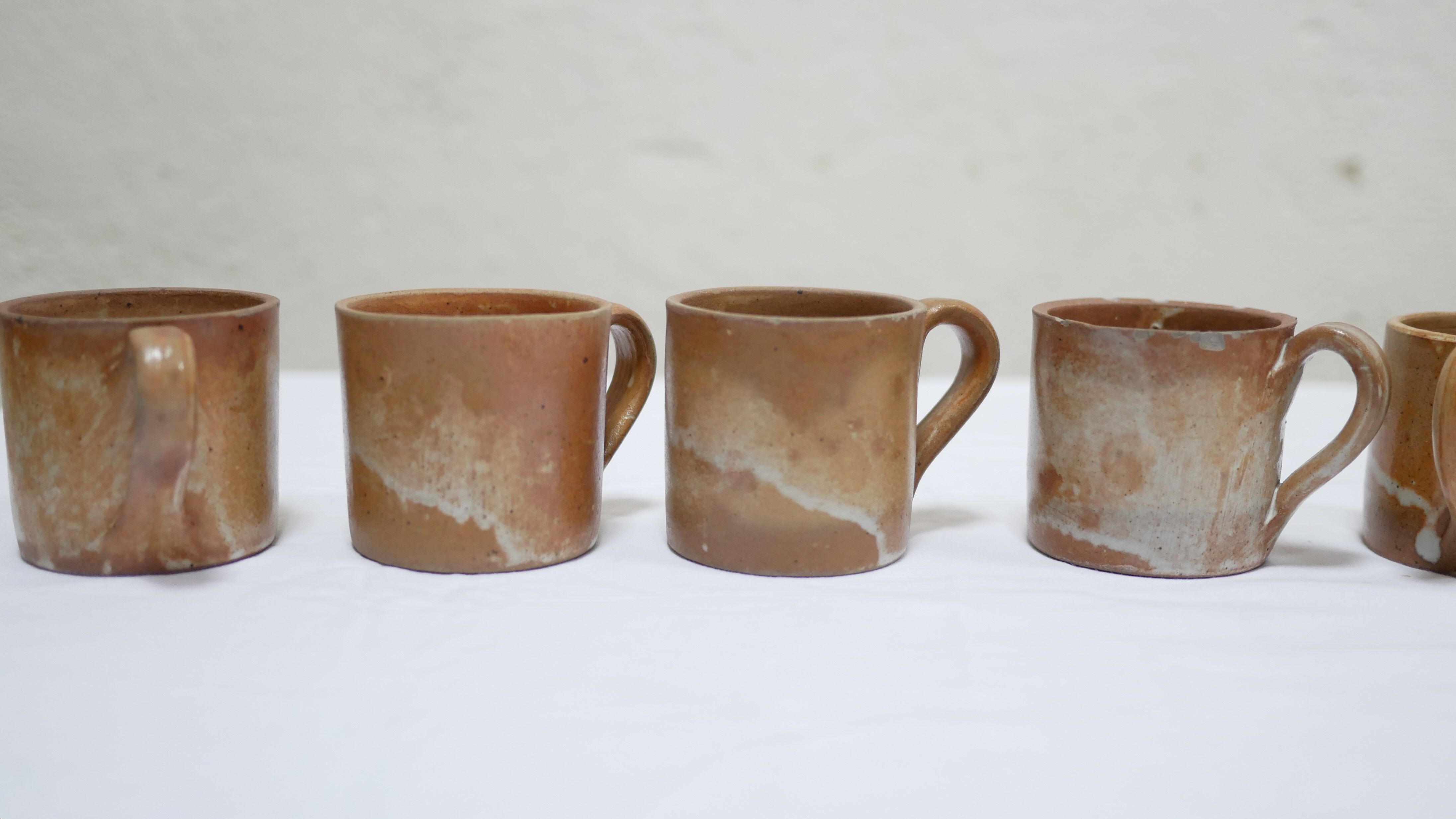 Series of 8 cups and vintage stoneware cups
