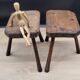 Pair of solid octagon cowhide tripod stools