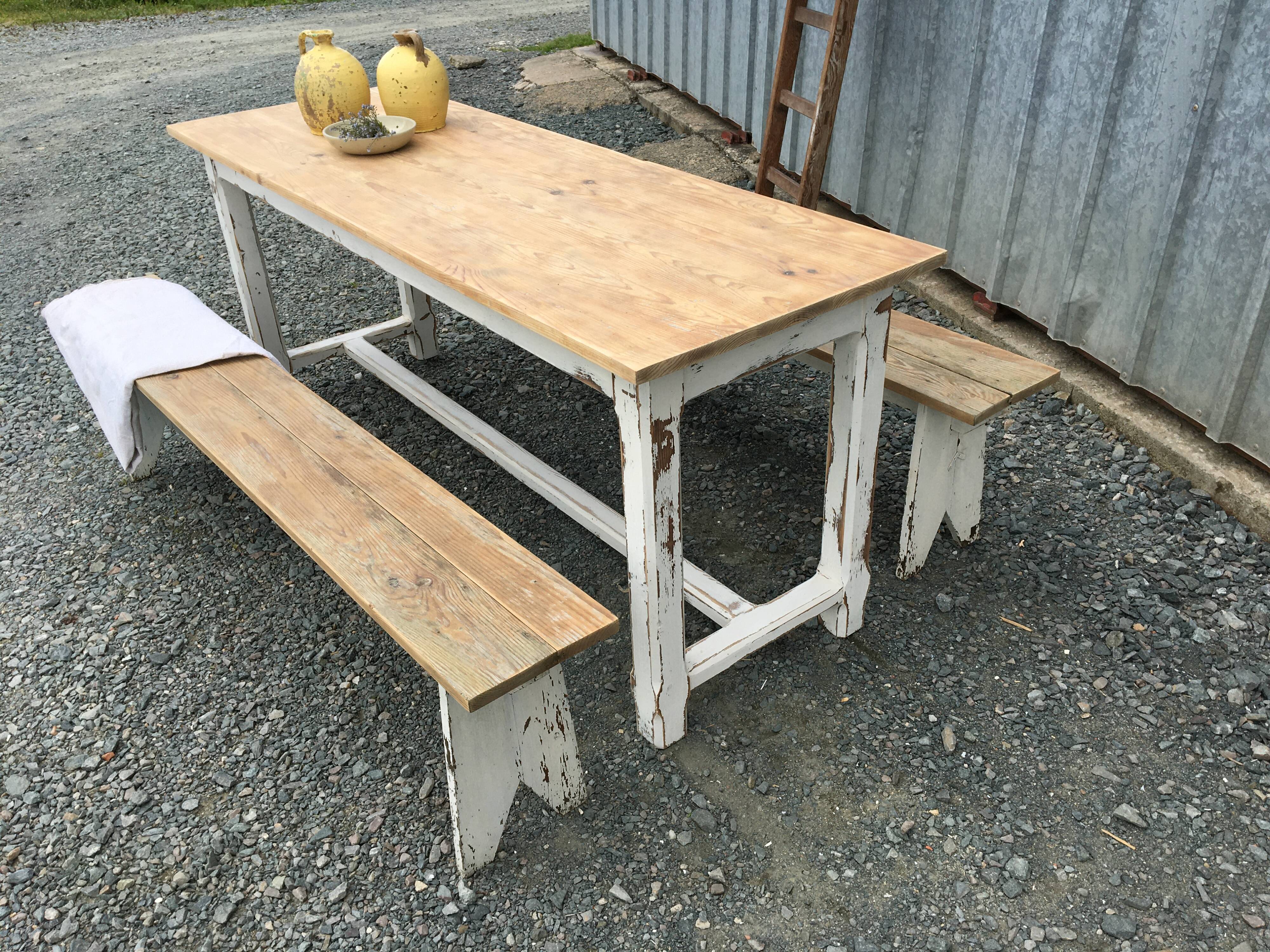 Farmhouse table with its two benches