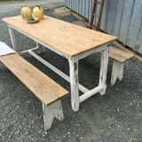 Farmhouse table with its two benches