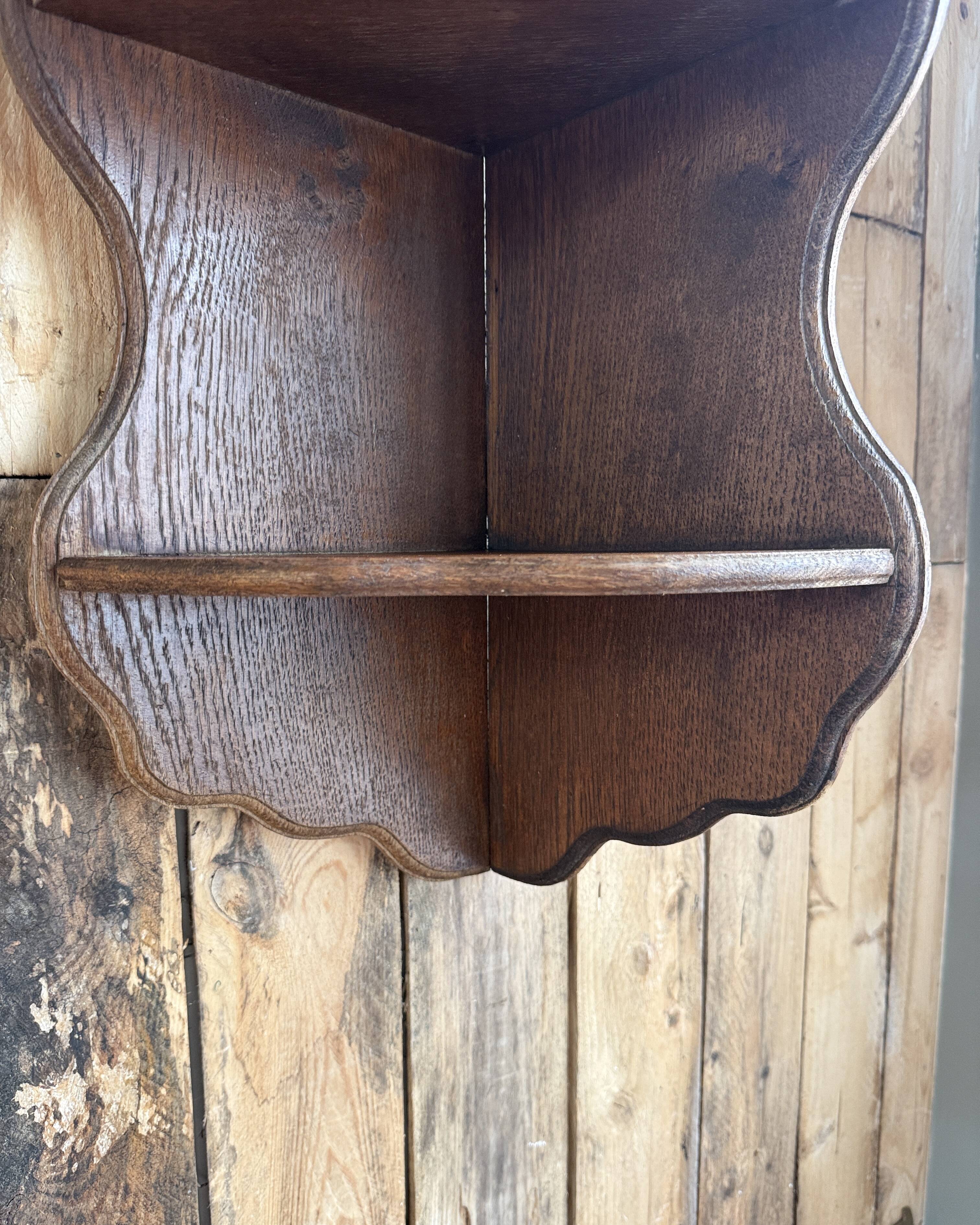 Old corner shelf in solid oak