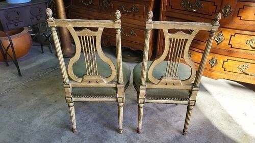 Pair of Louis XVI style chairs from the 18th century with lyre back.