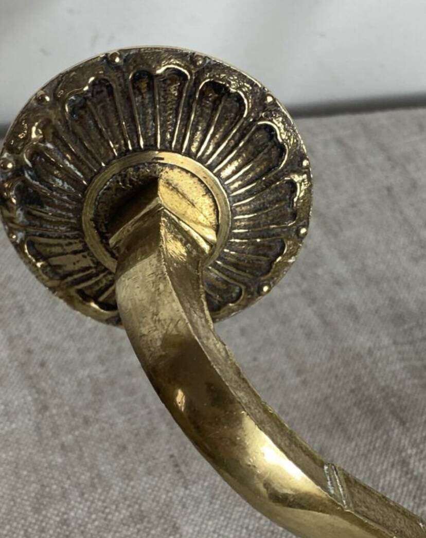 Pair of wall candle holders in bronze