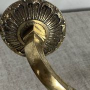 Pair of wall candle holders in bronze