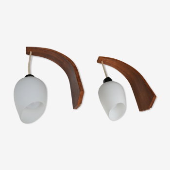 Pair of teak and opaline wall lamps