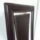 Set of 6 wooden chairs covered in leather.