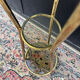 Golden tripod stand with smoked glass from the 1970s.