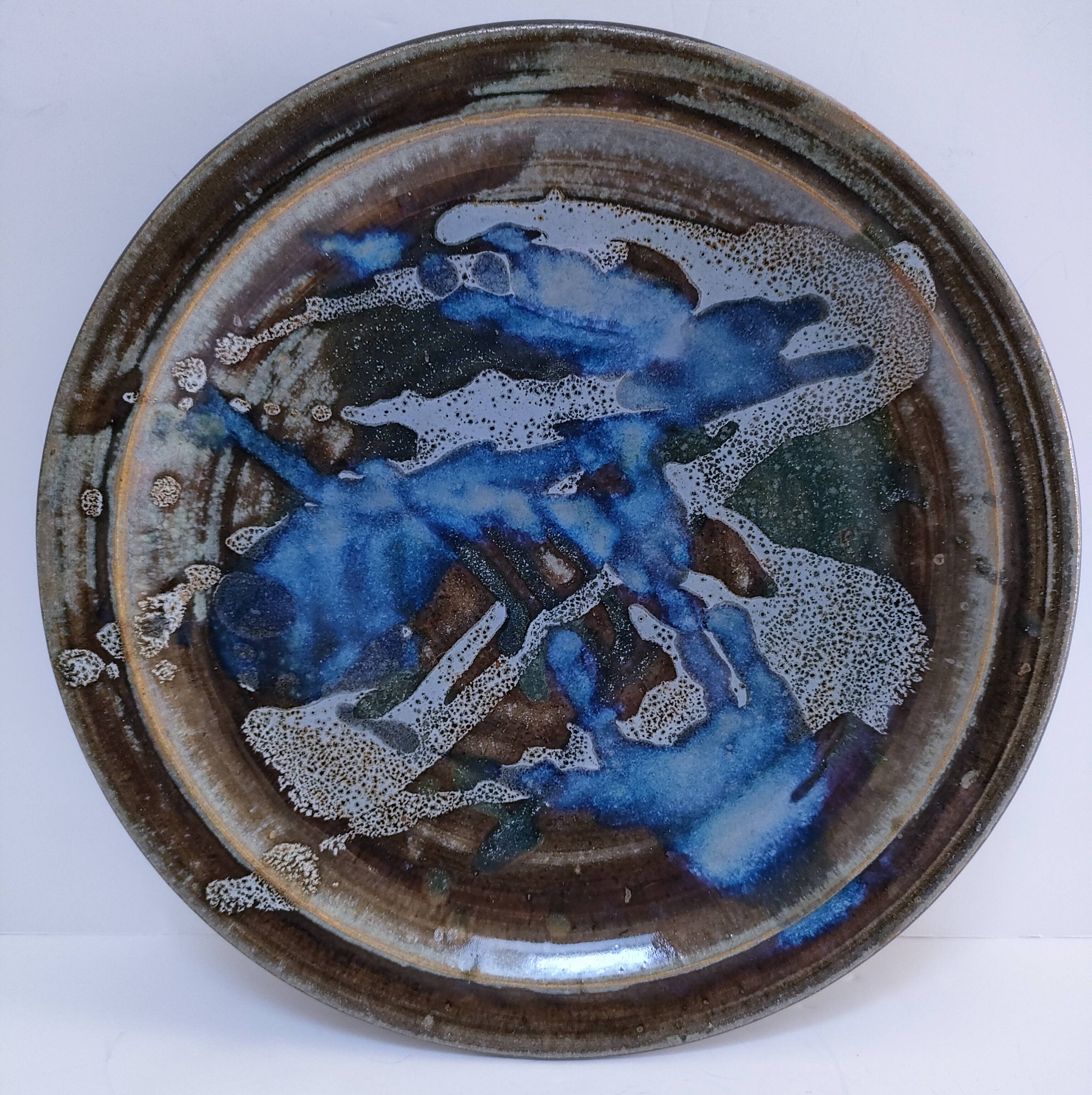 large enamelled stoneware plate signed mcb la borne