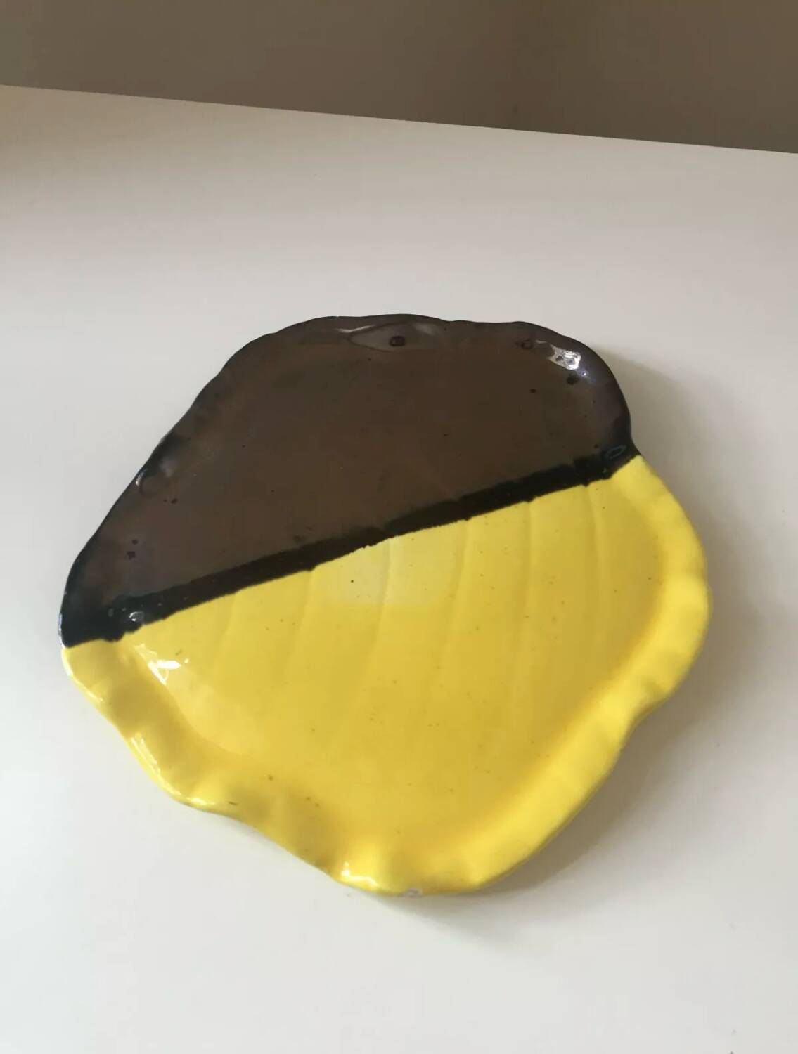 Black and yellow Vallauris plate/saucer