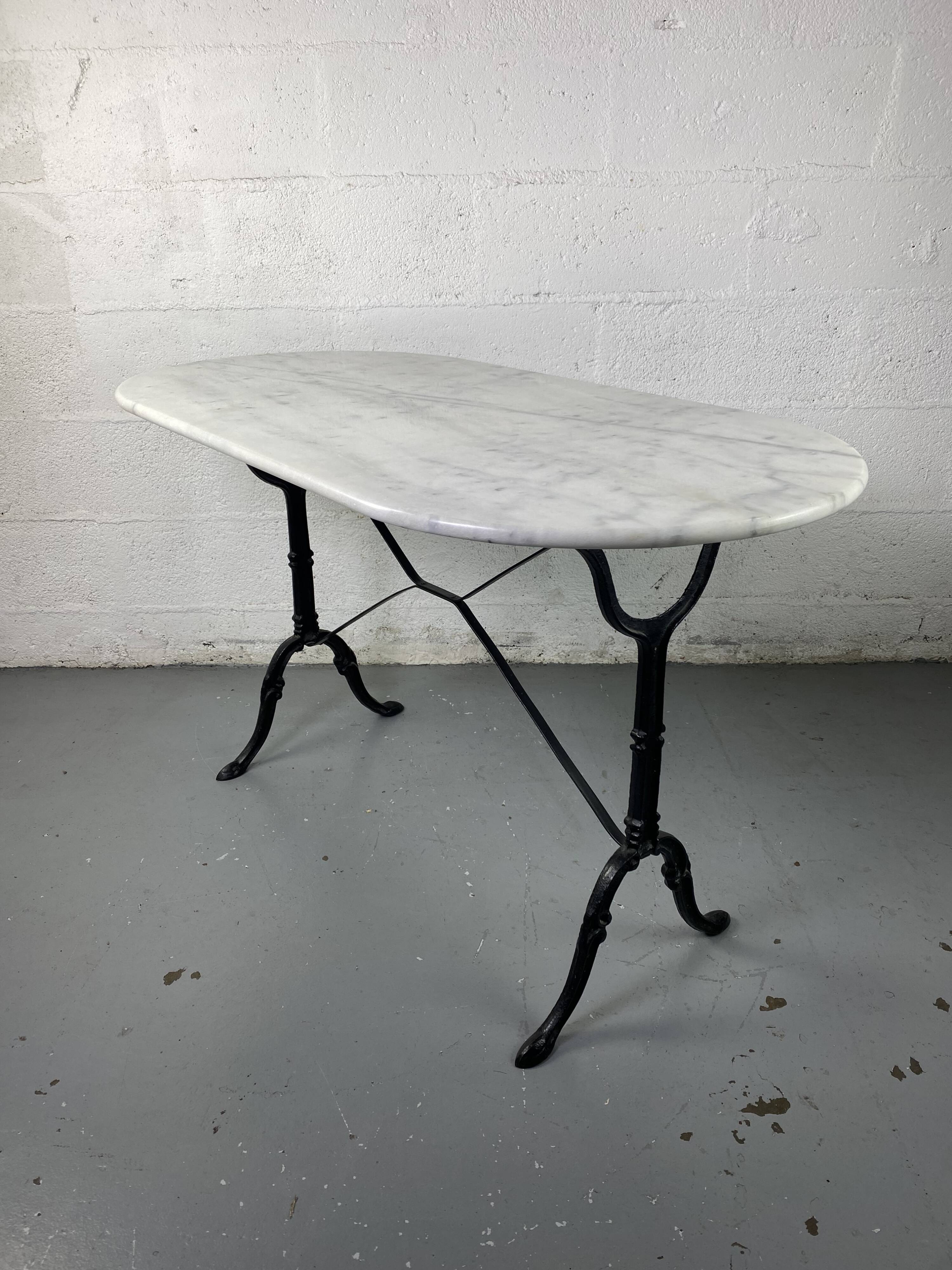 Marble and wrought iron bistro table